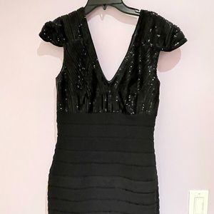 Elegant basix dress in perfect condition and shape barely worn! Sequince upper